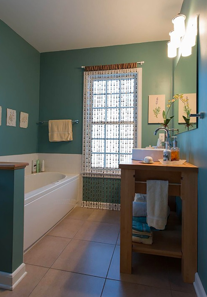Bathroom - mid-sized coastal 3/4 brown tile bathroom idea in Cedar Rapids with a one-piece toilet and green walls