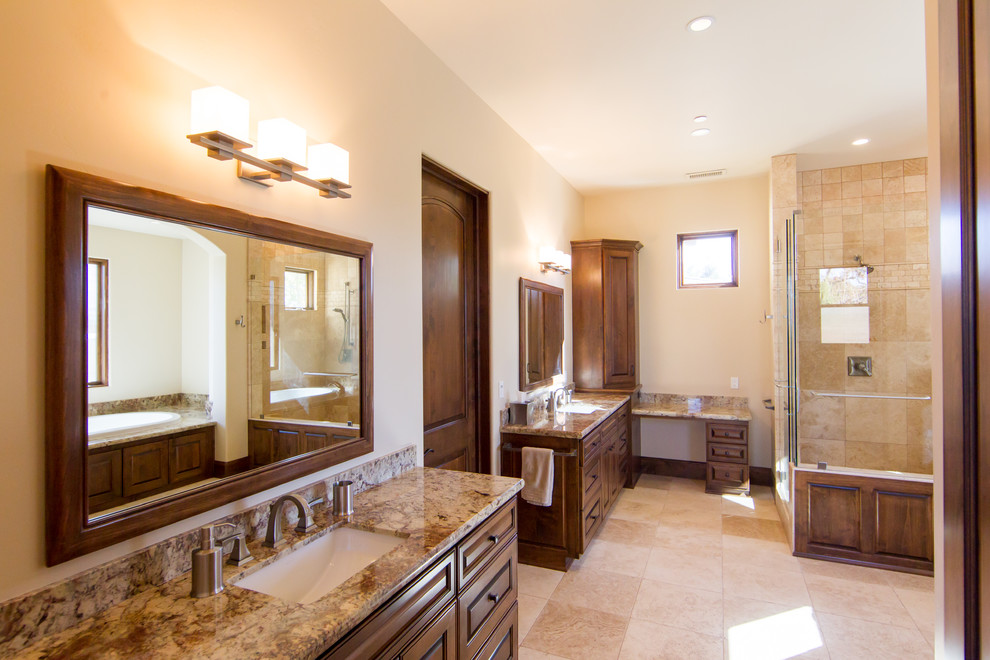 Large tuscan master stone tile and beige tile travertine floor bathroom photo in San Luis Obispo with an undermount sink, raised-panel cabinets, beige cabinets, granite countertops, a one-piece toilet and beige walls