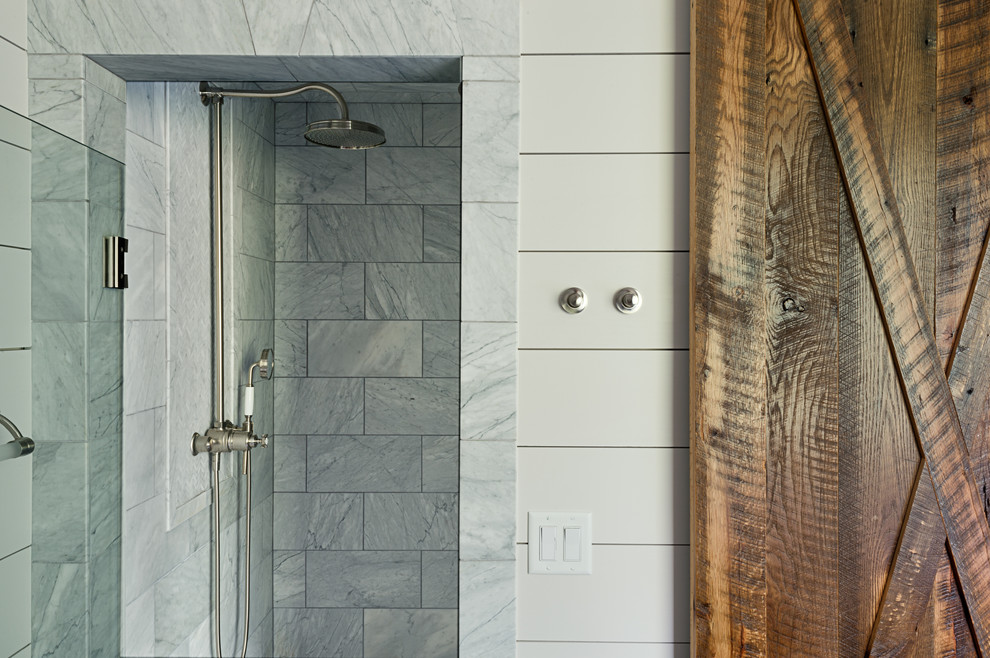 Example of a mid-sized transitional master porcelain tile porcelain tile and gray floor bathroom design in Other with blue walls, flat-panel cabinets, gray cabinets, an undermount sink, marble countertops and a hinged shower door