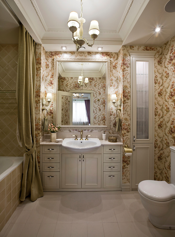 Elegant master beige tile and ceramic tile ceramic tile alcove bathtub photo in Moscow with multicolored walls, white cabinets, a drop-in sink, recessed-panel cabinets and a two-piece toilet
