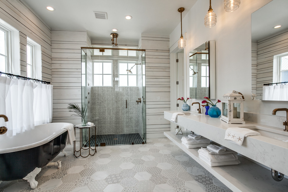 Bathroom - coastal gray floor bathroom idea in Austin with white walls, an undermount sink and a hinged shower door