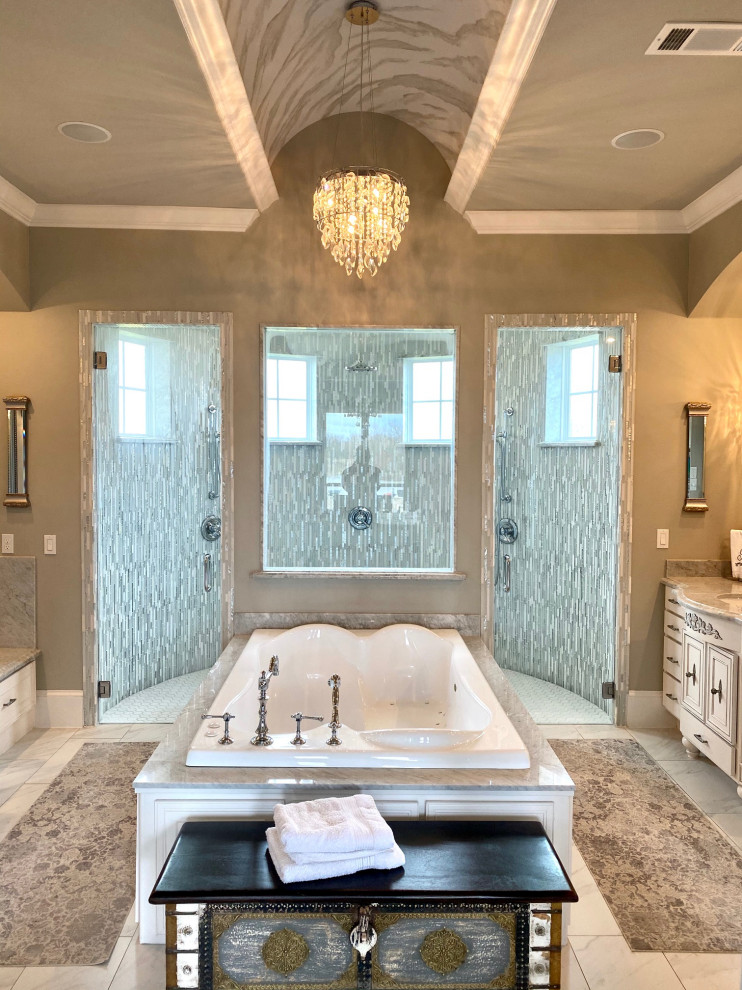 Inspiration for a large french country master gray tile and marble tile porcelain tile and white floor bathroom remodel in Dallas with recessed-panel cabinets, distressed cabinets, a two-piece toilet, gray walls, an undermount sink, marble countertops, a hinged shower door and gray countertops