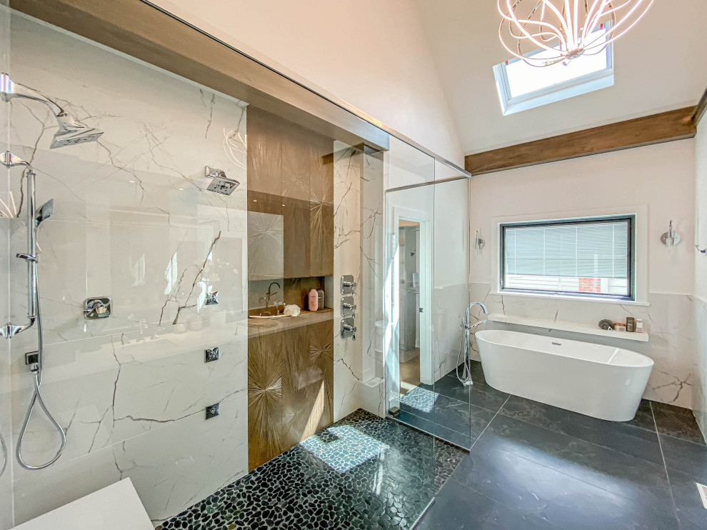 This is an example of an expansive industrial ensuite bathroom in Chicago with a freestanding bath, a walk-in shower, white tiles, porcelain tiles, a submerged sink, engineered stone worktops, an open shower, white worktops, double sinks and a floating vanity unit.