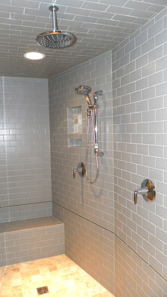 Example of a cottage gray tile and ceramic tile double shower design in Other with an undermount sink, raised-panel cabinets, white cabinets, granite countertops and a two-piece toilet