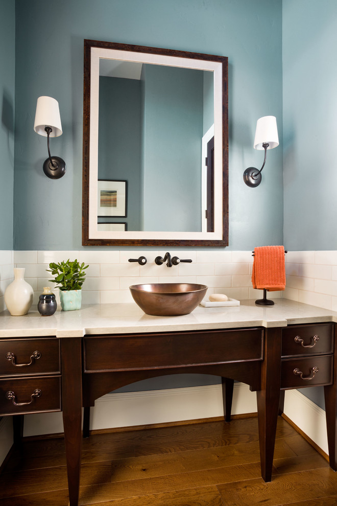 Example of a large transitional 3/4 white tile and ceramic tile medium tone wood floor bathroom design in Portland with a vessel sink, furniture-like cabinets, dark wood cabinets, blue walls, quartz countertops and beige countertops