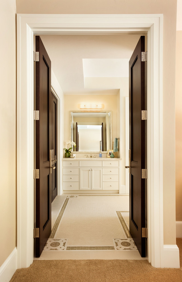 Design ideas for an expansive classic ensuite bathroom in Portland with white cabinets, recessed-panel cabinets, beige walls, ceramic flooring and granite worktops.