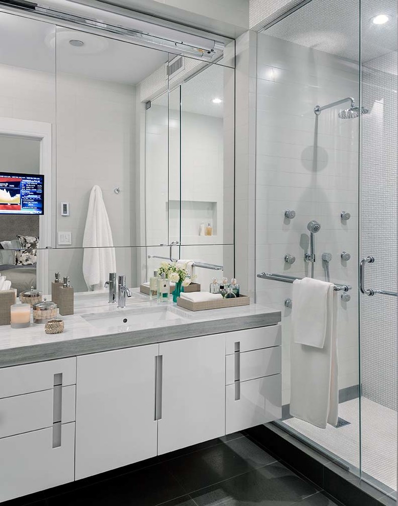 Photo of a contemporary bathroom in New York with a hinged door.