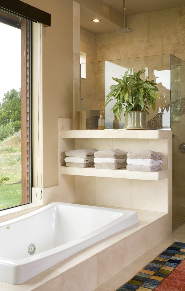 Inspiration for a large contemporary beige tile travertine floor bathroom remodel in Portland with beige walls