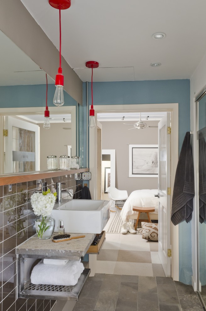 Bathroom - modern bathroom idea in Other with a vessel sink