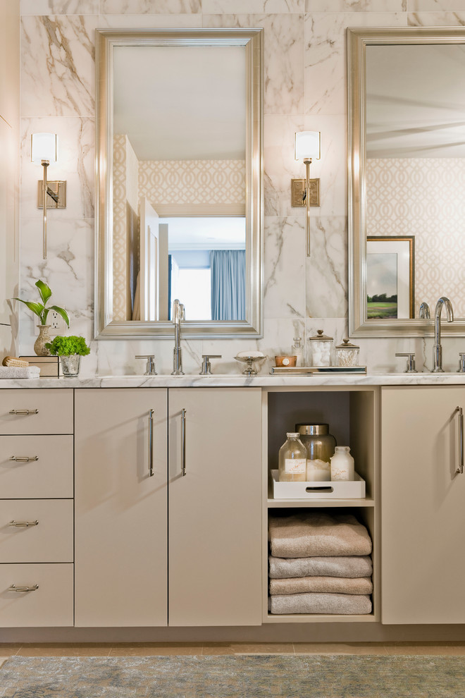 Inspiration for a large contemporary ensuite bathroom in Boston with a submerged sink, flat-panel cabinets, beige cabinets, marble worktops, beige tiles, ceramic tiles, beige walls and ceramic flooring.