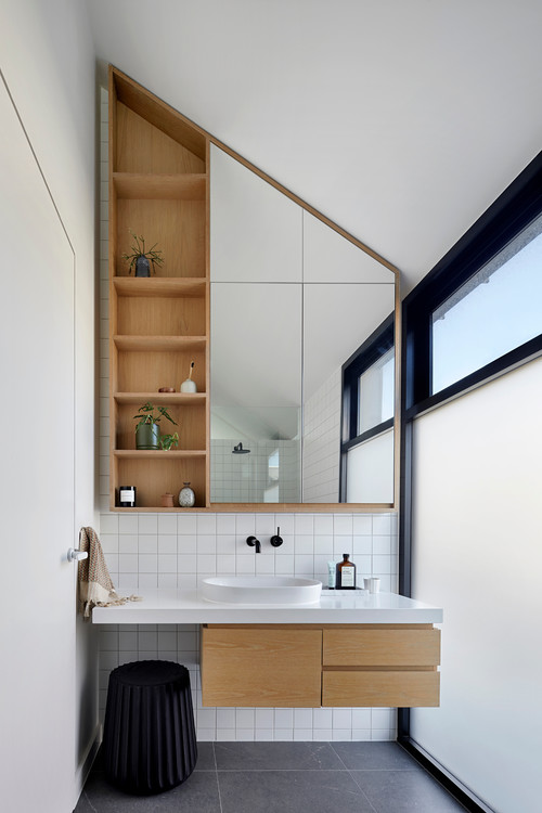 Scandinavian Simplicity: Mirrored Cabinets and Wood Shelves for Smart Bathroom Storage