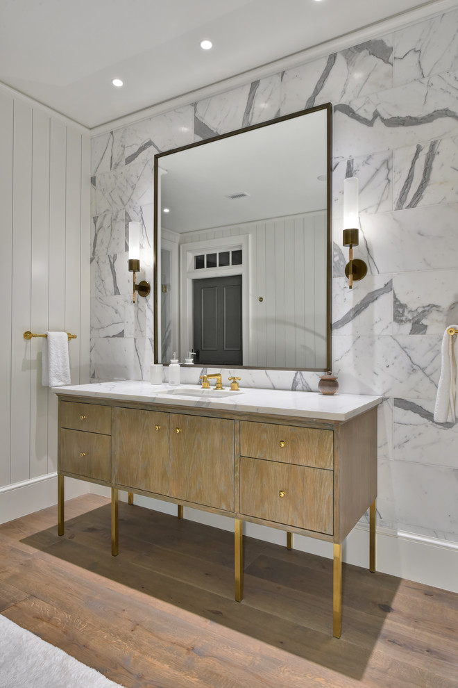 Large farmhouse master black and white tile, gray tile and marble tile medium tone wood floor and brown floor bathroom photo in Charleston with flat-panel cabinets, medium tone wood cabinets, white countertops, an undermount sink, marble countertops and white walls