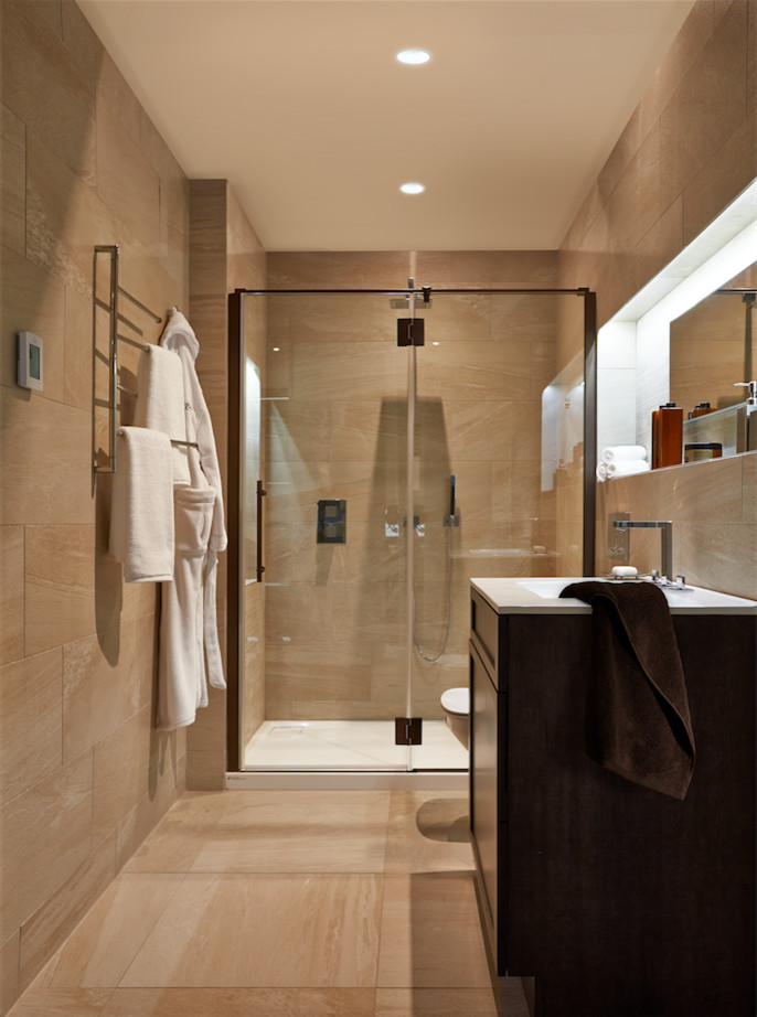 Inspiration for a mid-sized modern master beige tile and ceramic tile ceramic tile bathroom remodel in Chicago with flat-panel cabinets, dark wood cabinets, a one-piece toilet, beige walls and a drop-in sink