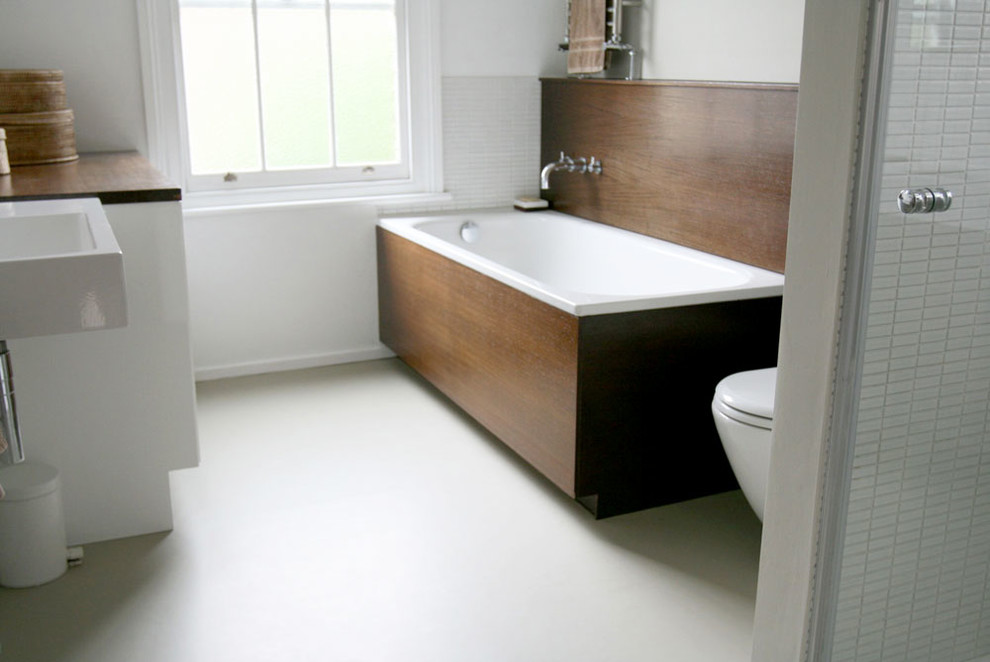 Photo of a modern bathroom in London with vinyl flooring.