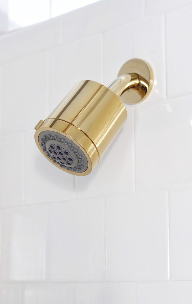 На фото: ванная комната в стиле модернизм с ванной в нише, душем над ванной, белой плиткой, белыми стенами и шторкой для ванной с