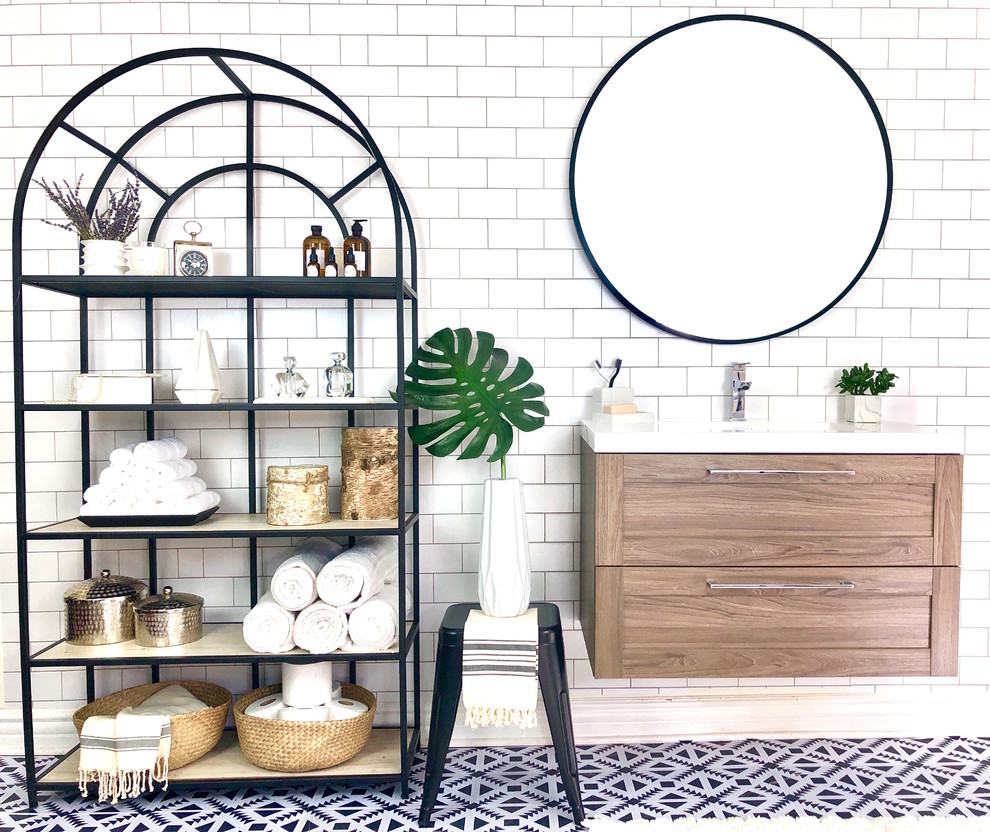 Источник вдохновения для домашнего уюта: ванная комната в стиле модернизм с коричневыми фасадами, полом из мозаичной плитки, монолитной раковиной и черным полом