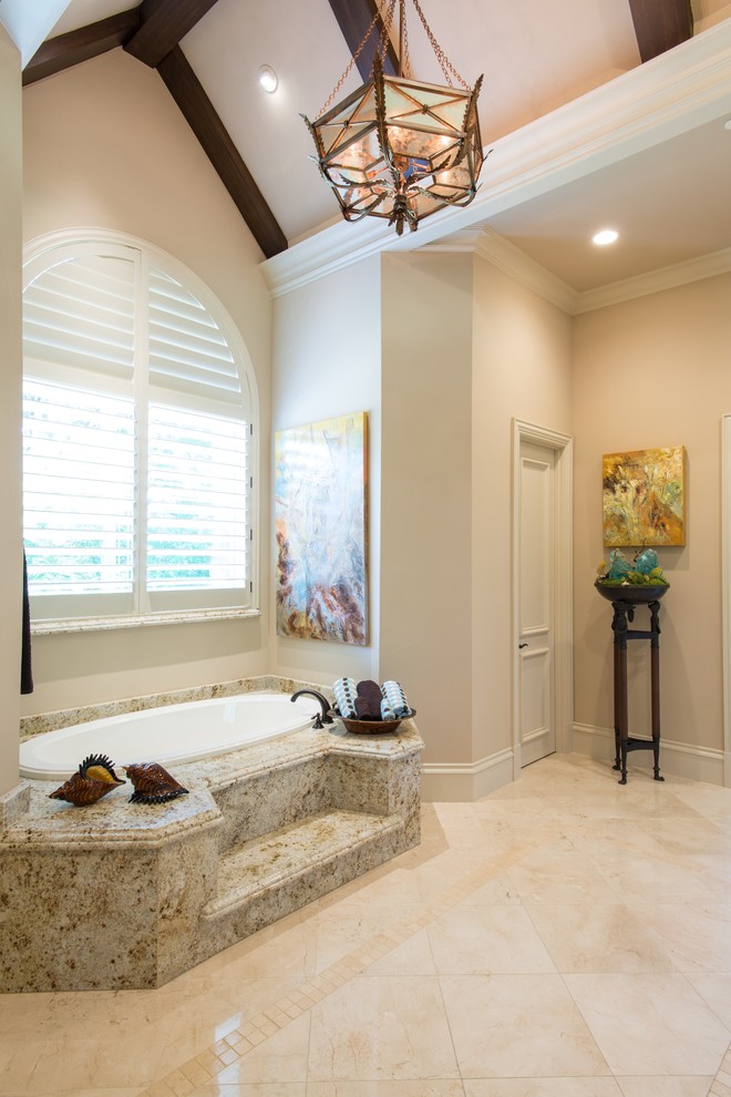 Medium sized classic ensuite bathroom in Dallas with an alcove bath, beige walls and marble flooring.