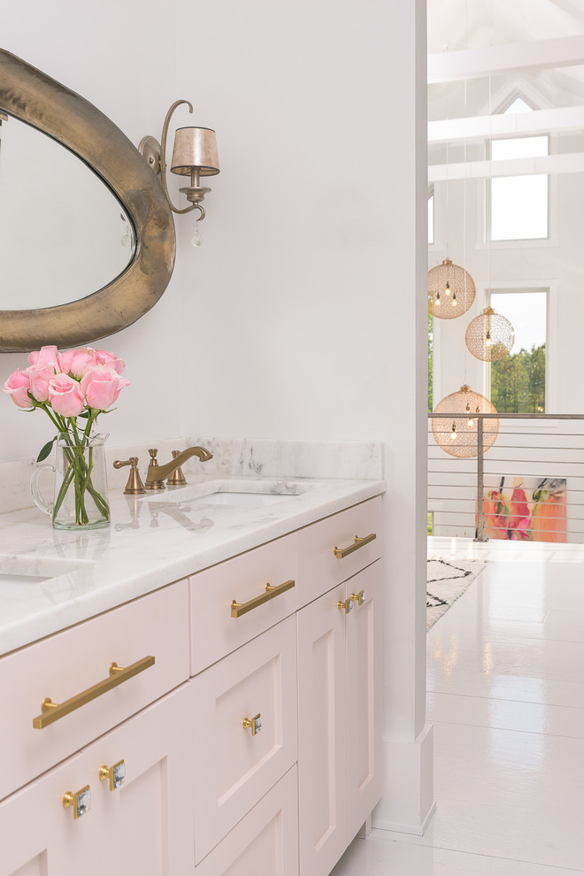 Inspiration for a mid-sized cottage master white tile and ceramic tile painted wood floor and white floor bathroom remodel in Other with shaker cabinets, a one-piece toilet, white walls, a drop-in sink and quartzite countertops