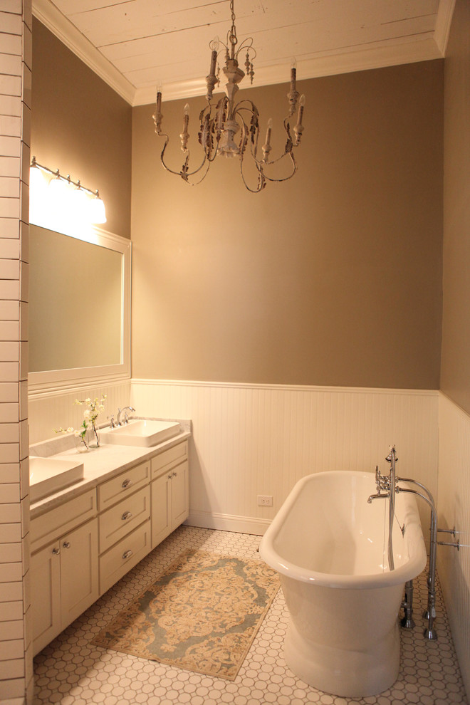 Mid-sized farmhouse master white tile ceramic tile bathroom photo in Austin with white walls