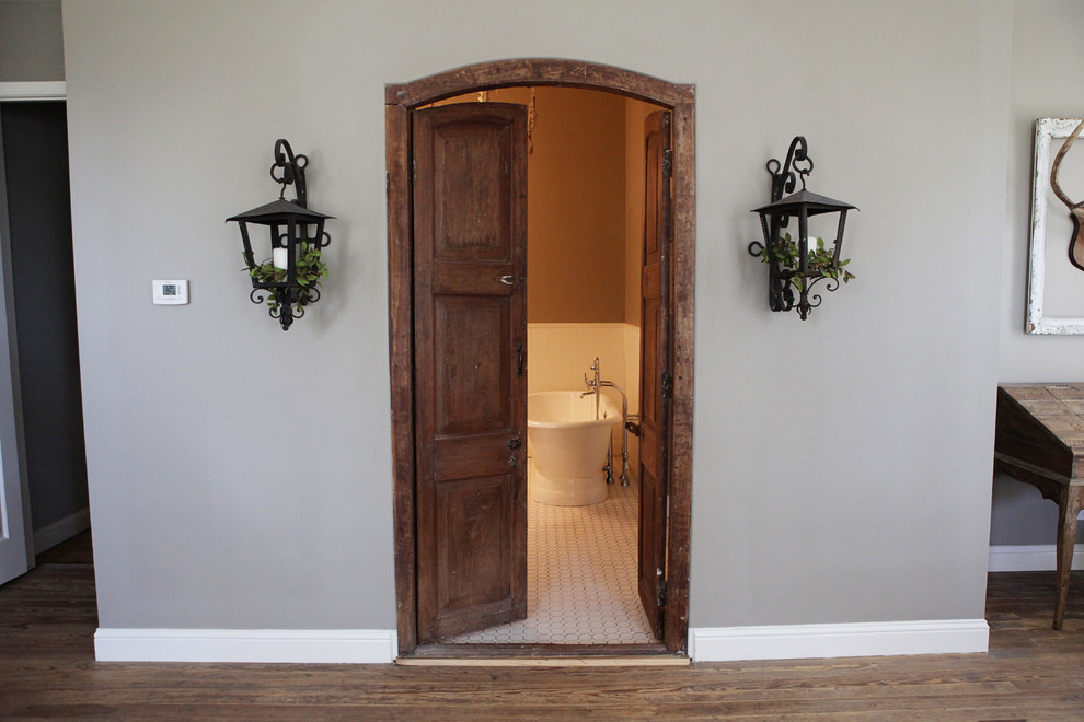 Example of a mid-sized farmhouse master white tile ceramic tile bathroom design in Austin with white walls