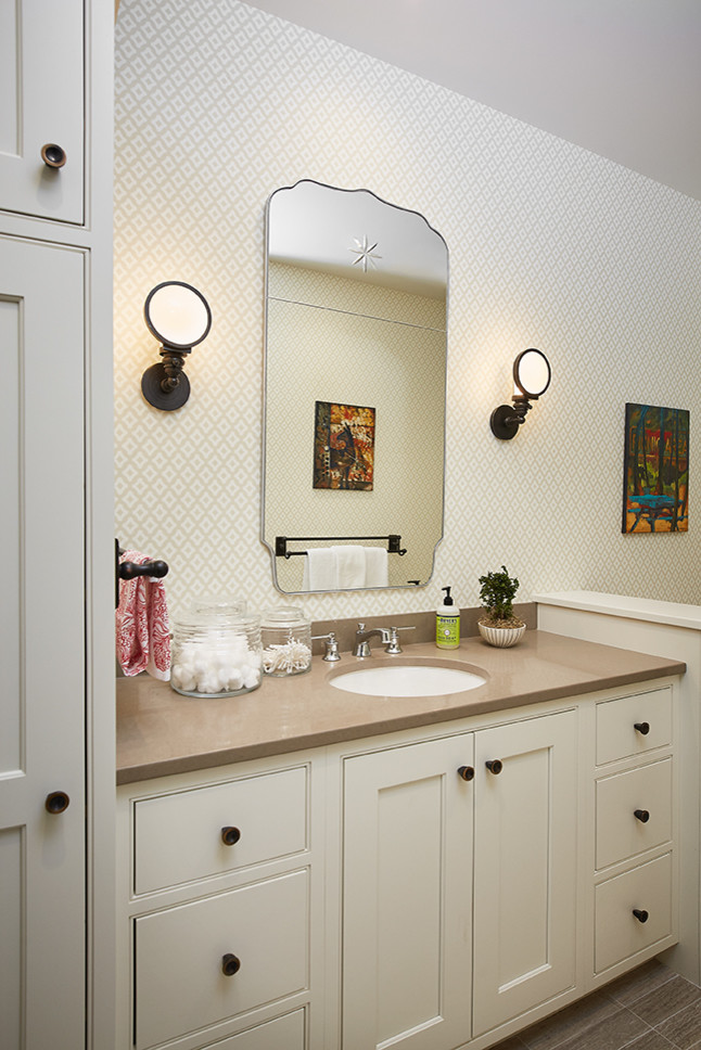 Bathroom - mid-sized transitional 3/4 white tile and ceramic tile porcelain tile and gray floor bathroom idea in Grand Rapids with glass-front cabinets, beige cabinets, beige walls, a two-piece toilet, an undermount sink, quartz countertops and brown countertops