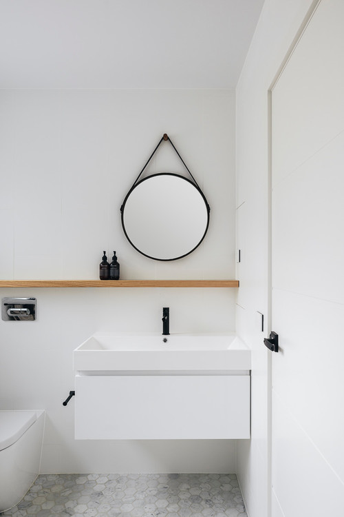 Embrace Simplicity: Minimalist Bathroom Perfection with White Vanity and Wood Shelf Mirror Ideas