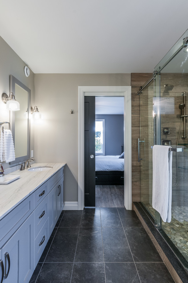 Large arts and crafts master black tile and ceramic tile ceramic tile bathroom photo in Toronto with an undermount sink, shaker cabinets, white cabinets, granite countertops, a two-piece toilet and gray walls