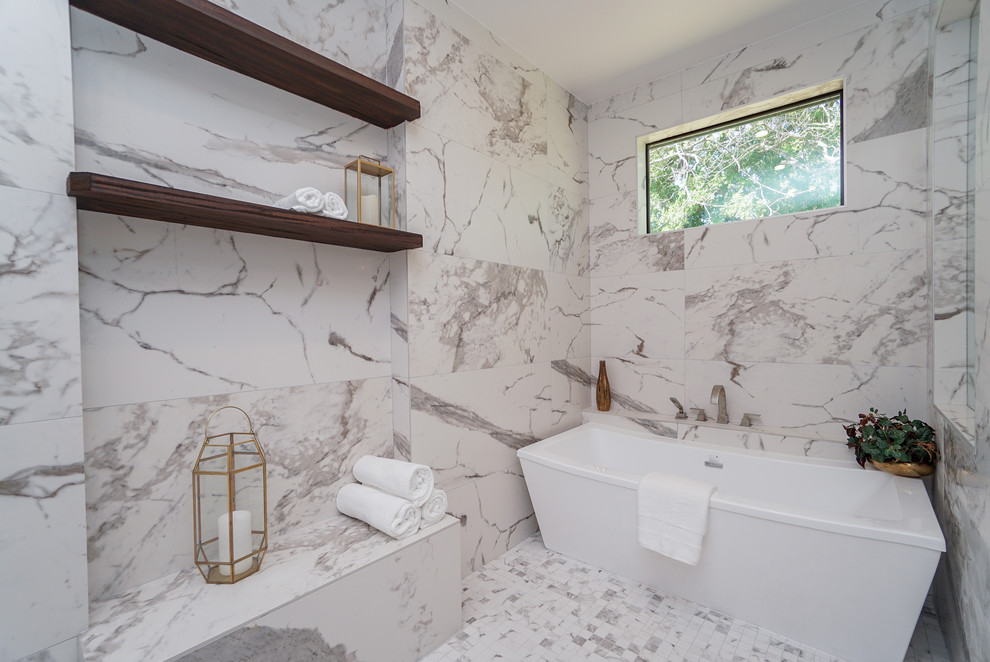 Bathroom - large transitional master white tile and porcelain tile porcelain tile and white floor bathroom idea in Houston with shaker cabinets, gray cabinets, a two-piece toilet, white walls, an undermount sink, glass countertops, a hinged shower door and white countertops