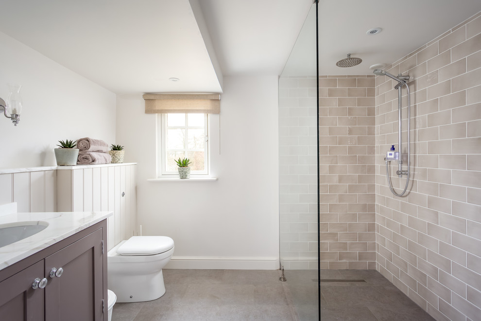 Photo of a medium sized contemporary bathroom in Gloucestershire with shaker cabinets, a walk-in shower, white walls, a submerged sink and marble worktops.