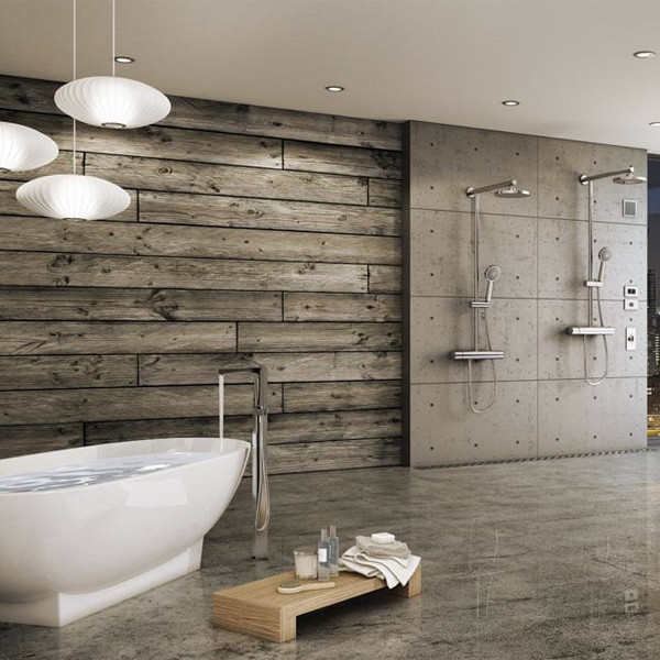 Modern inredning av ett badrum, med ett fristående badkar, en dubbeldusch, grå väggar, grått golv och med dusch som är öppen