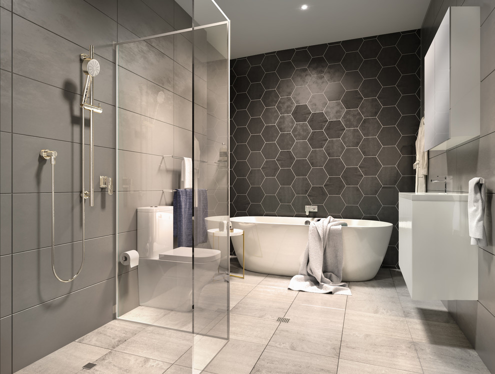Inspiration for a mid-sized modern gray tile porcelain tile bathroom remodel in Canberra - Queanbeyan with flat-panel cabinets, white cabinets, a one-piece toilet, quartzite countertops and a hinged shower door