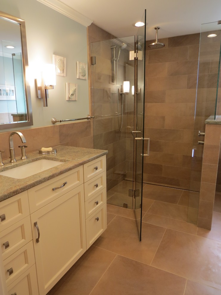 Mid-sized trendy 3/4 porcelain tile porcelain tile walk-in shower photo in Portland Maine with an undermount sink, raised-panel cabinets, white cabinets, granite countertops, a two-piece toilet and blue walls