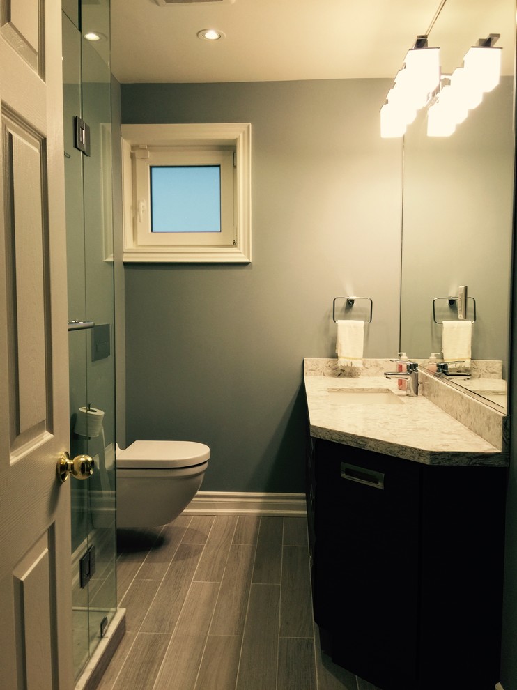 Small contemporary shower room bathroom in Toronto with engineered stone worktops, porcelain tiles and porcelain flooring.
