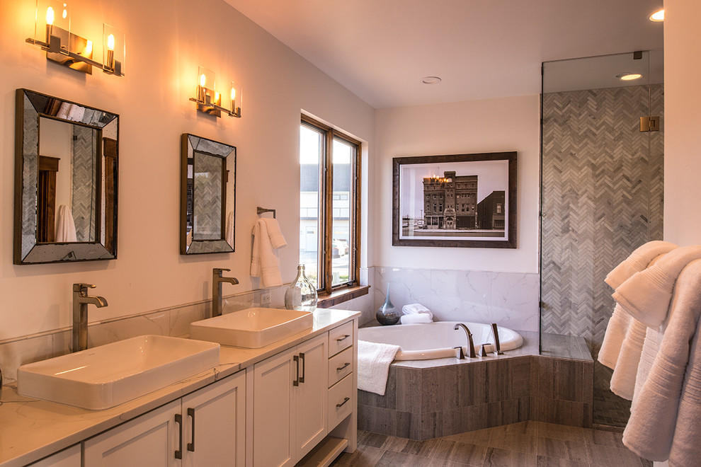 Large transitional master gray tile and mosaic tile porcelain tile and gray floor bathroom photo in Other with shaker cabinets, white cabinets, a two-piece toilet, beige walls, an undermount sink, marble countertops and a hinged shower door