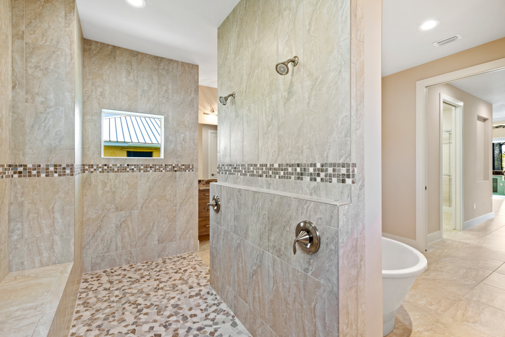 Example of a beach style master bathroom design in Other with multicolored walls