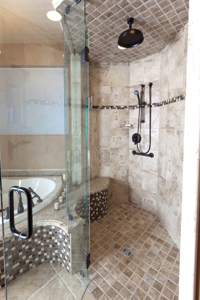 Design ideas for a traditional bathroom in Seattle with a corner bath, a built-in shower, beige tiles, stone tiles, beige walls and mosaic tile flooring.