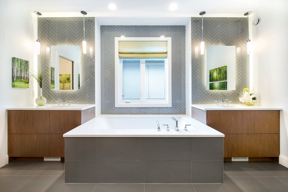Photo of a contemporary ensuite bathroom in Calgary with grey tiles and ceramic tiles.