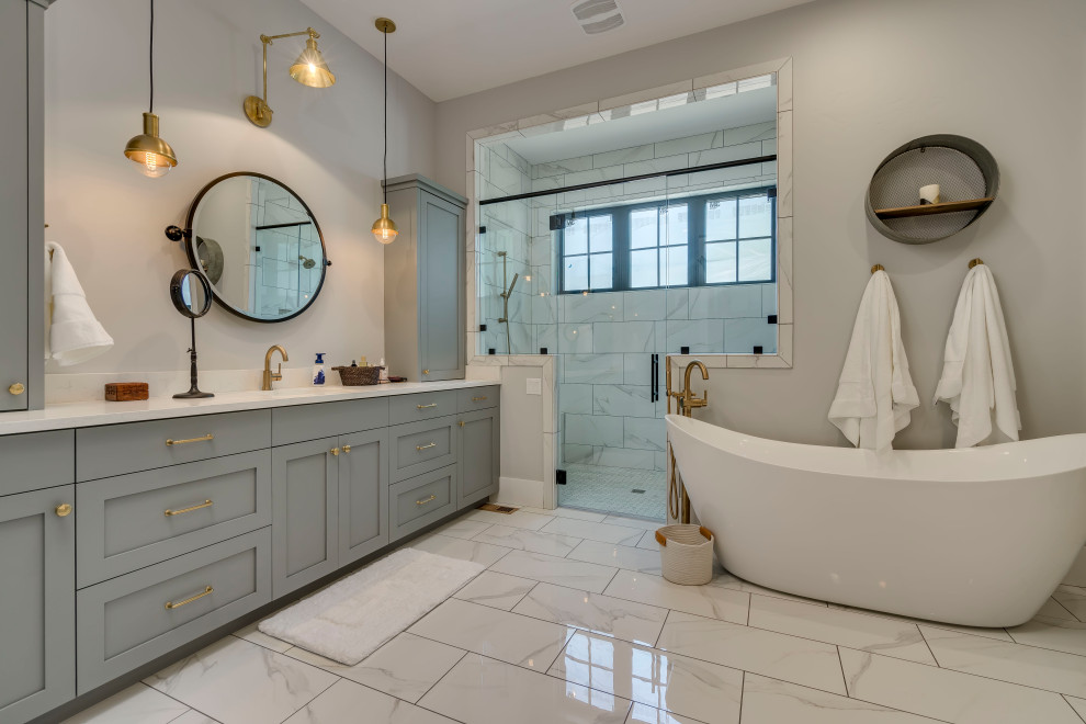 Inspiration for a traditional ensuite bathroom in Seattle with shaker cabinets, grey cabinets, a freestanding bath, an alcove shower, multi-coloured tiles, grey walls, a submerged sink, multi-coloured floors, a hinged door, white worktops, a single sink and a built in vanity unit.