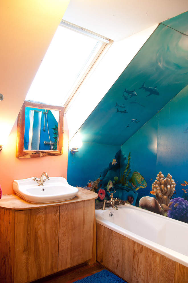 Photo of a bohemian family bathroom in Other with a vessel sink.