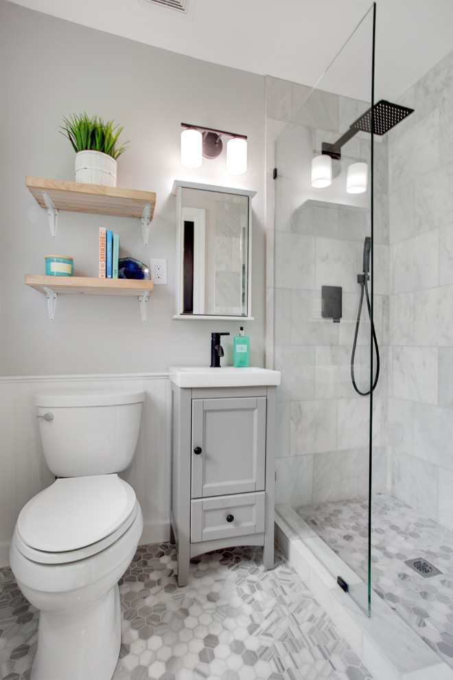This is an example of a small classic ensuite bathroom in Kansas City with grey cabinets, a walk-in shower, grey tiles, marble tiles, grey walls, marble flooring, a built-in sink and an open shower.