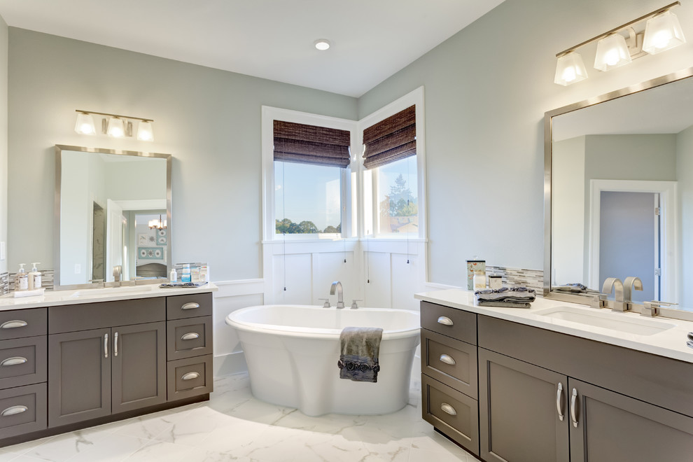 Design ideas for a traditional bathroom in Vancouver with a freestanding bath.