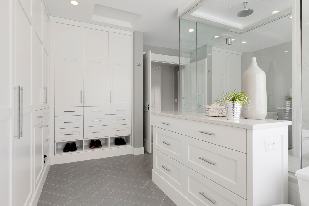 Bathroom - large transitional master porcelain tile, gray floor and double-sink bathroom idea in Minneapolis with shaker cabinets, gray cabinets, a one-piece toilet, gray walls, an undermount sink, solid surface countertops, a hinged shower door, white countertops and a built-in vanity