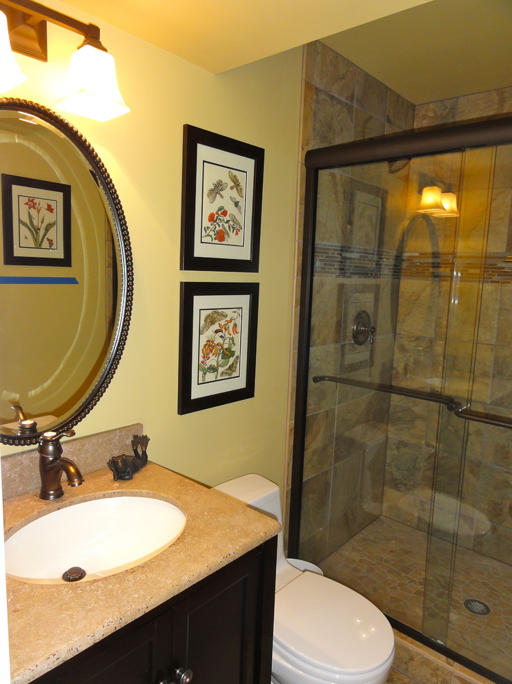 Inspiration for a small timeless 3/4 beige tile and stone tile ceramic tile alcove shower remodel in Baltimore with an undermount sink, granite countertops, a one-piece toilet, yellow walls and shaker cabinets