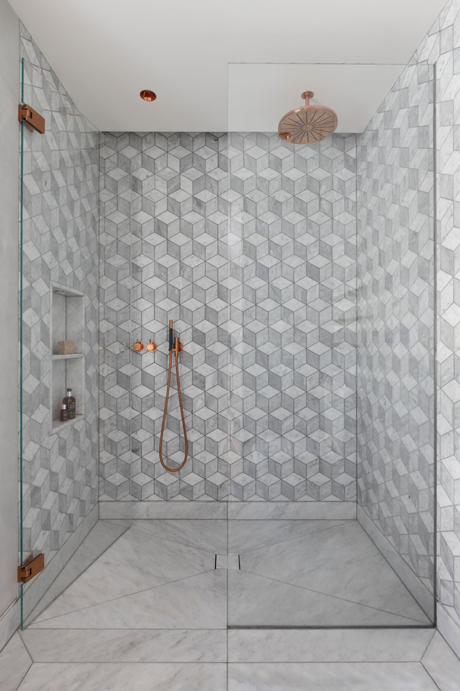 Medium sized contemporary wet room bathroom in London with grey tiles, white tiles, multi-coloured tiles, grey floors and an open shower.