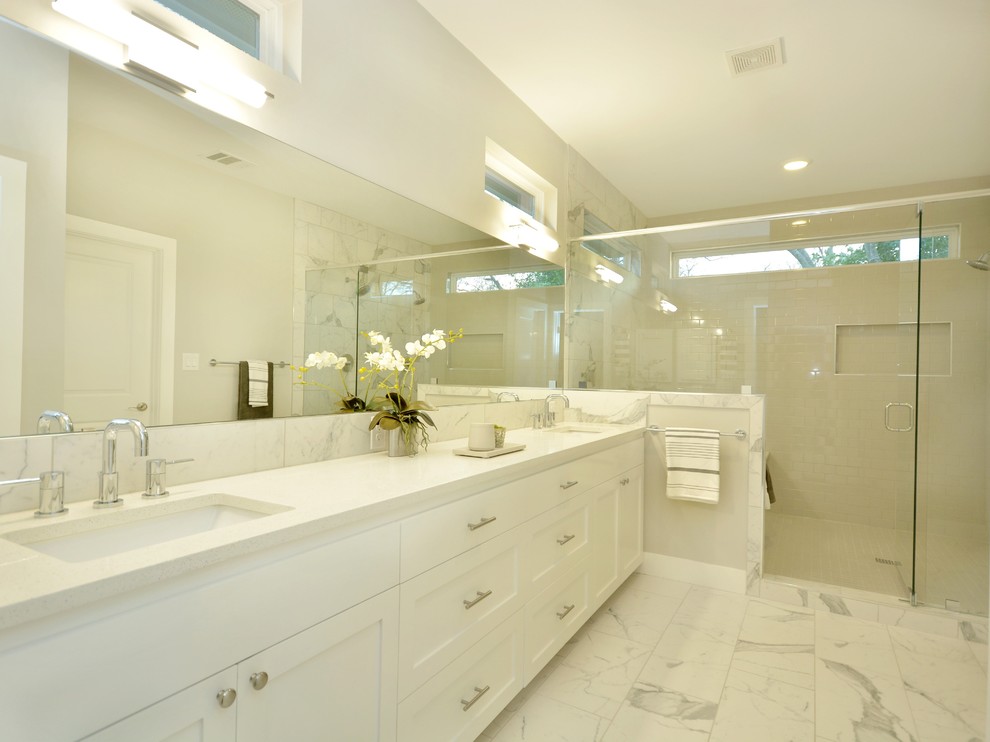 Inspiration for a large craftsman master white tile and stone tile marble floor bathroom remodel in Austin with shaker cabinets, white cabinets, gray walls, an undermount sink and quartzite countertops