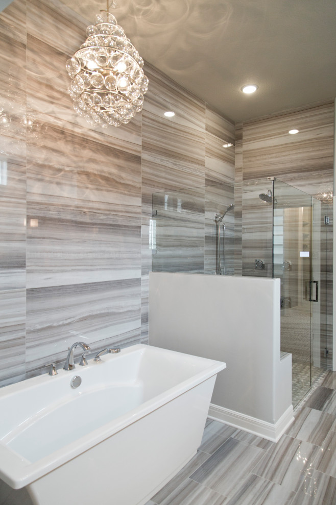 Large beach style master gray tile and ceramic tile ceramic tile, gray floor and double-sink bathroom photo in Kansas City with shaker cabinets, gray cabinets, beige walls, an undermount sink, quartz countertops, a hinged shower door, white countertops and a built-in vanity