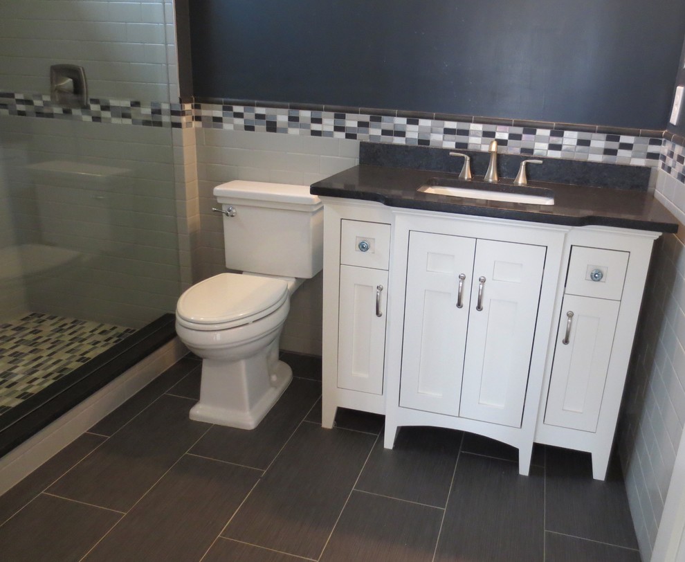 Medium sized classic shower room bathroom in Atlanta with shaker cabinets, white cabinets, a double shower, a one-piece toilet, multi-coloured tiles, porcelain tiles, black walls, porcelain flooring, a built-in sink and granite worktops.