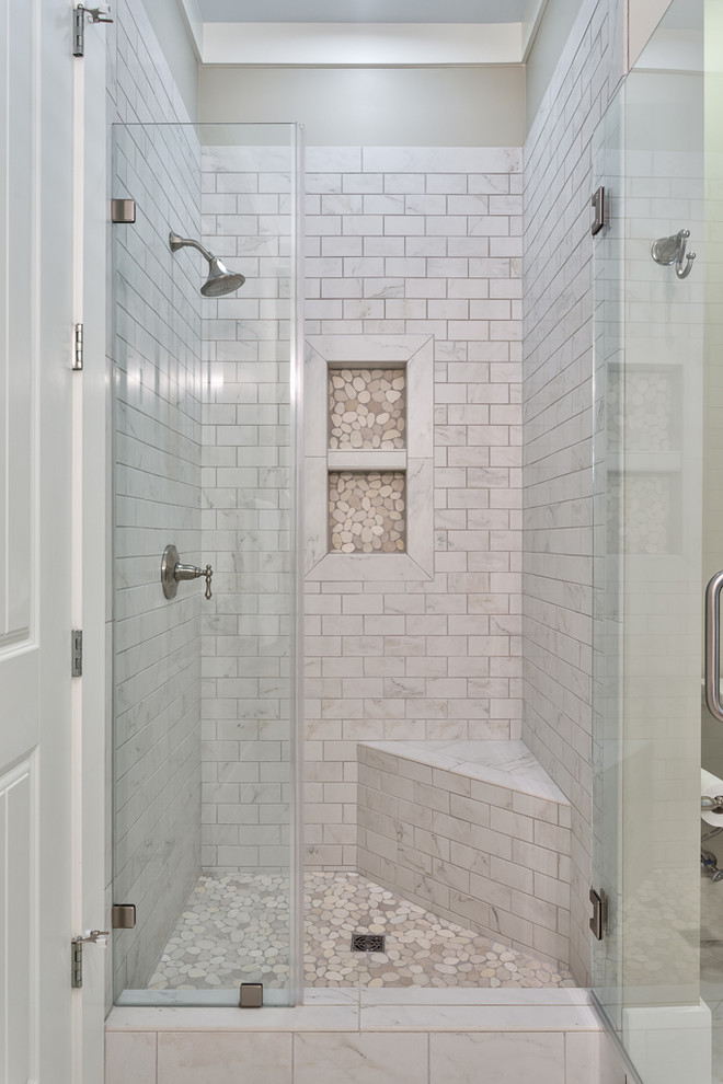 Inspiration for a rustic white tile and pebble tile pebble tile floor bathroom remodel in Other