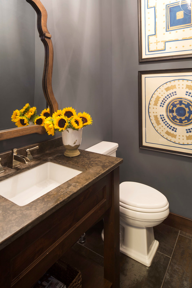 Elegant 3/4 gray tile and porcelain tile porcelain tile bathroom photo in Minneapolis with an undermount sink, flat-panel cabinets, dark wood cabinets, granite countertops, a two-piece toilet and blue walls