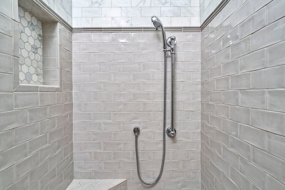 Medium sized classic ensuite bathroom in Charleston with white tiles, metro tiles, grey walls, light hardwood flooring and a built-in shower.